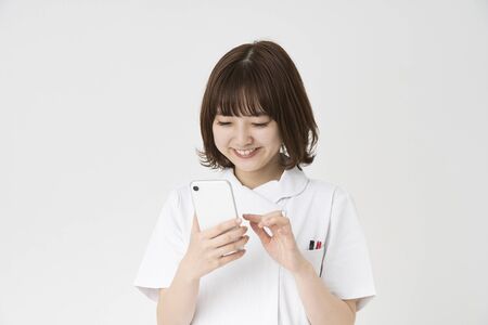 Nurse with Mart Phoneの写真素材