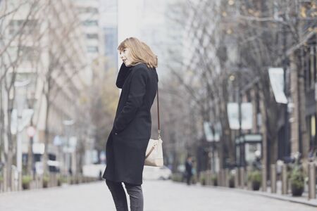 Walking through the business district of Tokyo, Japan