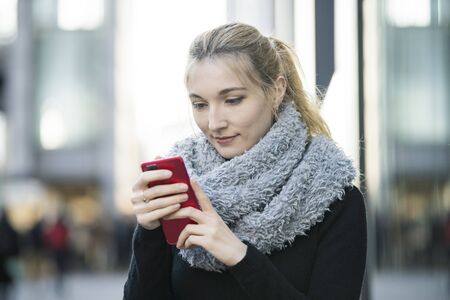 Women working with smart phones