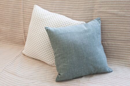 Sofa and cushions in the room