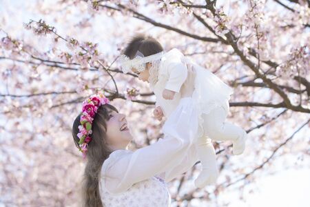 Baby, Mother and Cherry Treeの写真素材