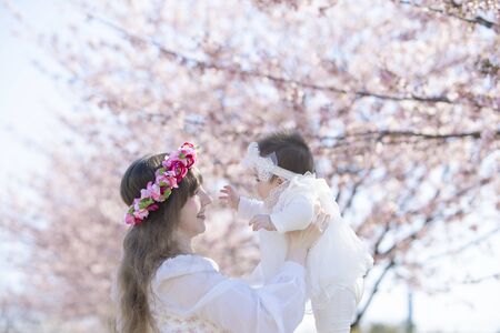 Baby, Mother and Cherry Treeの写真素材
