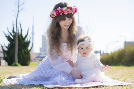 Parents and children playing in the Parkの写真素材