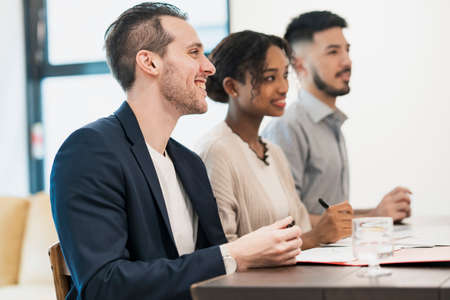 A snapshot of the business scene with young multinational members