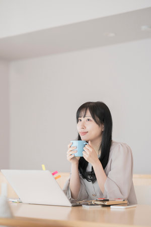 A woman taking a break while working from home