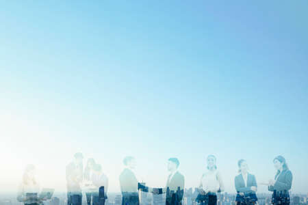 Composite photo of various businessmen and view of Tokyo