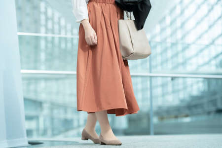 Smiley woman goes to working in business casual styleの写真素材