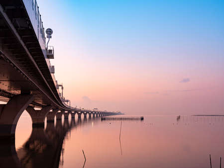 Highway running on the sea, evening view (Tokyo Bay Aqua Line)の写真素材