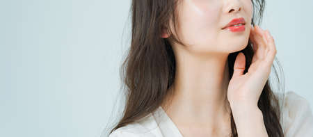 Young woman with long hair with make-up