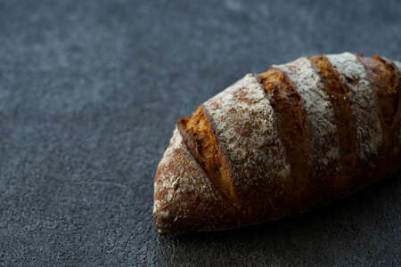 Bread placed on a black table