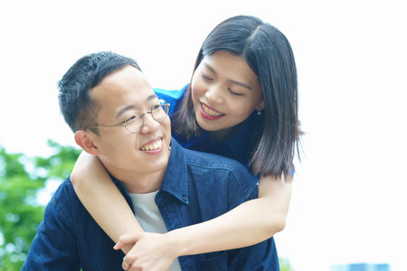 Young couple hugging with a smile