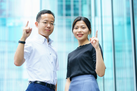 Young business person men and women doing guts pose