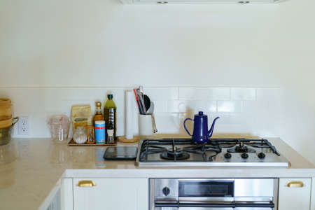 Bright kitchen with white walls in a apartment