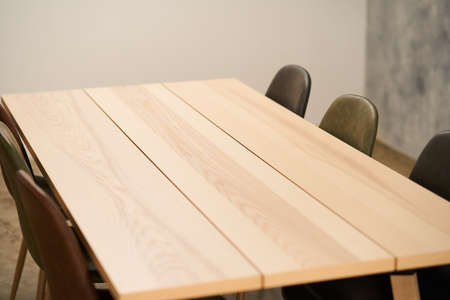 simple wooden square table and chairs in the room