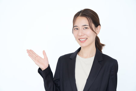 asian business woman doing hand signの写真素材