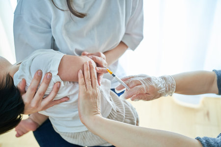 Infants crying and receiving vaccinations