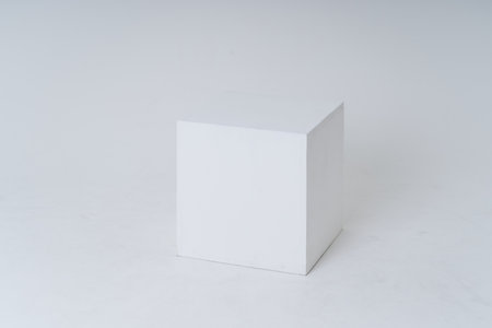 A white box in a white roomの写真素材