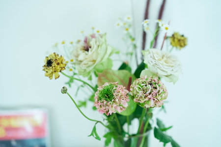 A quiet room with dried flowers filled with gentle lightの写真素材