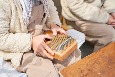 Image of family enjoying music at campの写真素材