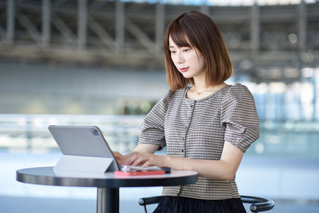 Asian young woman working with PCの写真素材