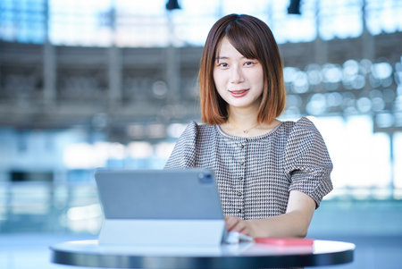 Asian young woman working with PCの写真素材