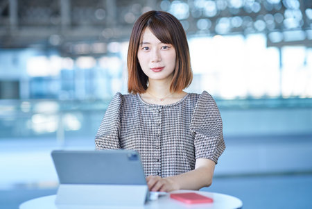 Asian young woman working with PCの写真素材