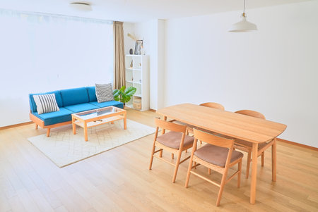 Bright interior with wooden table on the fine dayの写真素材