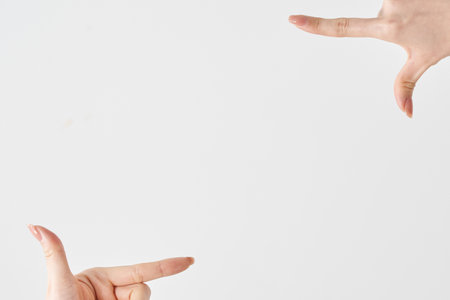 A space created by a square frame with both handsの写真素材