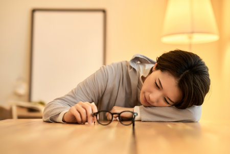 Middle-aged woman taking a break in her room