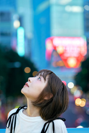 Portrait of young woman in the eveningの写真素材