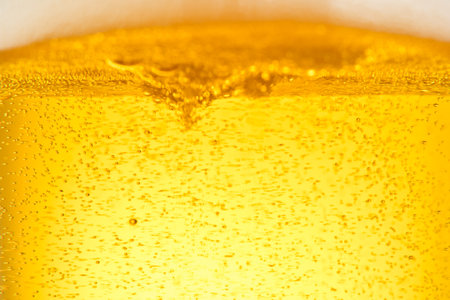 Close-up of beer being poured into a glass