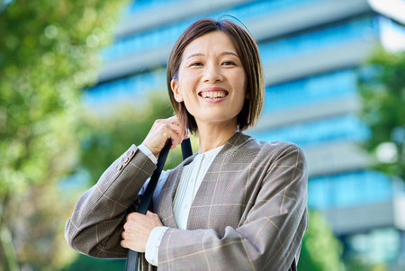 Woman commuting to work on fine day