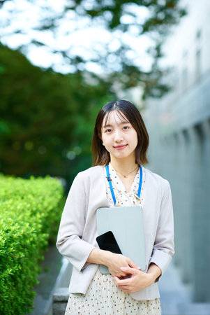 Portrait of a young business woman outdoorsの写真素材