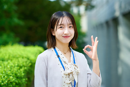 Businesswoman taking a positive pose outdoorsの写真素材
