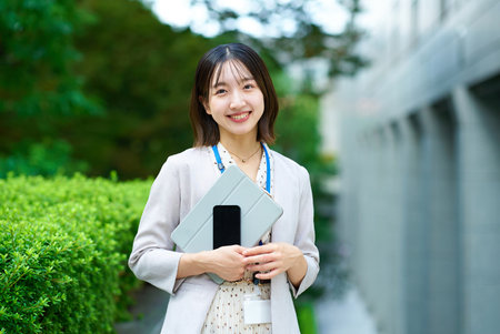 Portrait of a young business woman outdoorsの写真素材