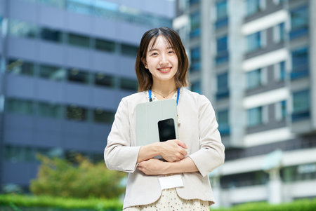 Portrait of a young business woman outdoorsの写真素材