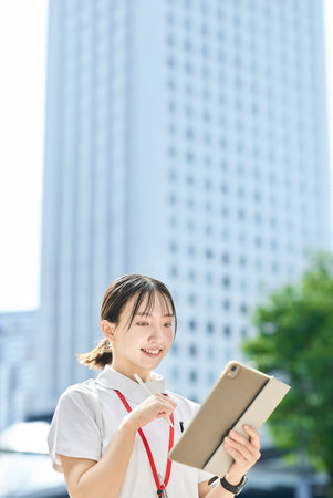 Portrait of a young nurse outdoorsの写真素材