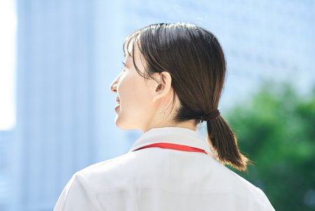 Portrait of a young nurse outdoorsの写真素材