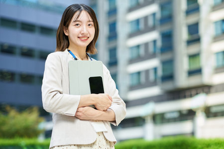 Portrait of a young business woman outdoorsの写真素材