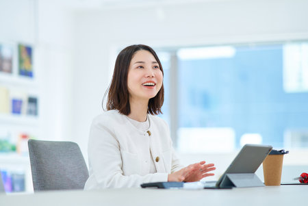 A young woman working in a friendly atmosphere