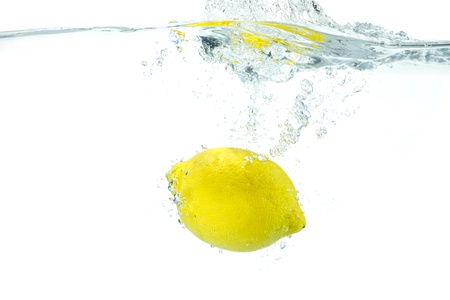 The lemon which jumps into waterの写真素材