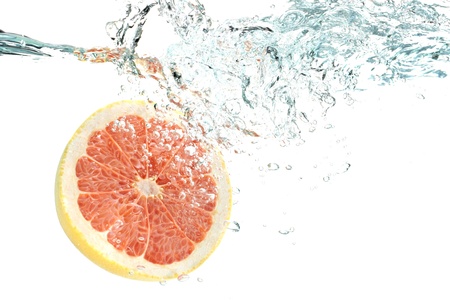 Grapefruit in waterの写真素材