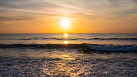 Beautiful sunset on the beach with sea waves and sky background.の素材
