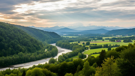panoramic view of the mountain valley and the river at sunsetの素材