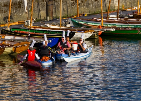 Vannes, Brittany, France: Men in the canoes, with the specific breizh hatsのeditorial素材