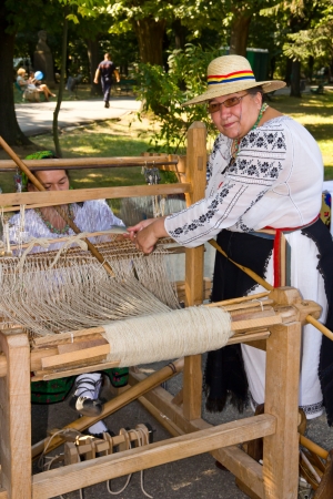 Bucharest Days 2011, Herastrau Park: Demonstration of romanian traditional weavingのeditorial素材