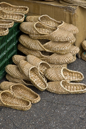 Pile of handmade slippers for saleのeditorial素材