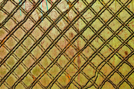 Metal wall background with wire rowsの写真素材