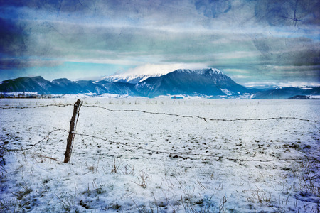 Piatra Craiului mountain massive in Brasov county, Romania view from East during winterの写真素材