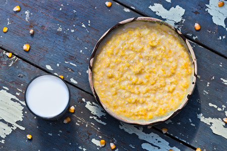 Countryside romanian dessert called pasat (coarsely ground maize with milk and sugar)の写真素材